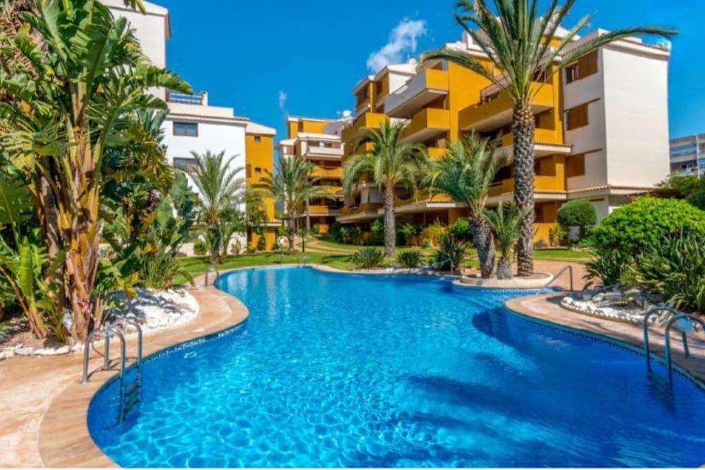 Espana - Punta Prima Orihuela Costa - Large For 6-people 85m2 And Terrace 40m2 Air Conditioning Wi-fi Living Kitchen 2 Bedrooms 2 Bathrooms 3 Swimming Pools Parking Security To The Sea 200m Only 40 Min To The Airport *